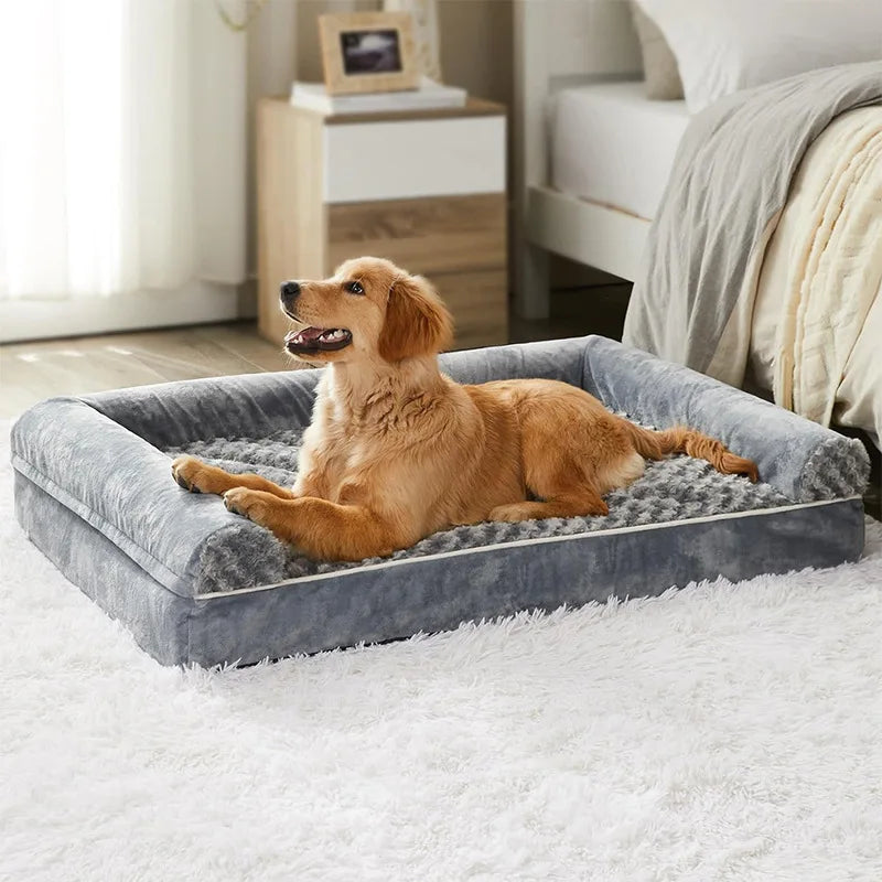 A dog lying comfortably on the Luxury Plush Dog Sofa Bed, looking attentively at something in the distance, highlighting the bed’s soft and supportive design.